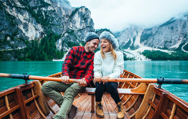 Mountain stories. Happy couple on a wanderlust vacation.