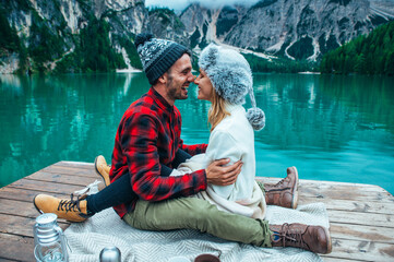 Mountain stories. Happy couple on a wanderlust vacation.