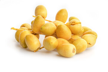 Barhi Dates palm yellow fruits (Phoenix Dactylifera) isolated on white background