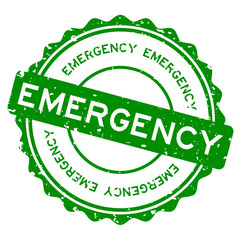 Grunge green emegency word round rubber seal stamp on white background