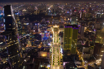 Fototapeta na wymiar Bright lights and busy streets of Vietnam's largest city.