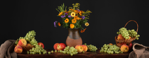 Panorama with a jug, wild flowers and fruits in a retro style