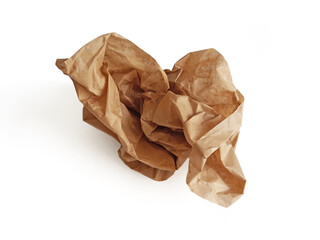 Piece of crumpled brown packing paper on white background. Aerial view of isolated kraft paper...