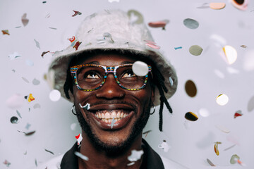 portrait of an hip hop music performer with confetti drop
