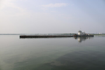 Obraz premium a barge floats on the Volga River