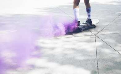 skaters with colored smoke bombs