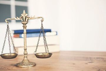 scales of justice,white background, book and scales of justice