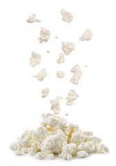Cottage cheese drops on a heap on a white background. Isolated