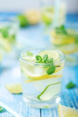 Glasses with lemon and lime lemonade