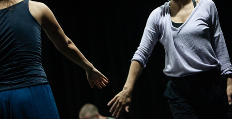 couple dancers contact hands in contact improvisation performance