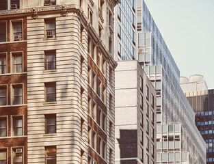 Old and modern buildings in Manhattan, color toning applied, New York City, USA.