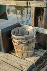 Old wooden peach buckets used for fishing as a storage containers for clams and crabs