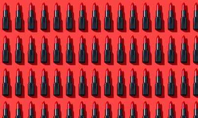 Creative pattern fashion photo of cosmetics beauty products red lipstick on a red background