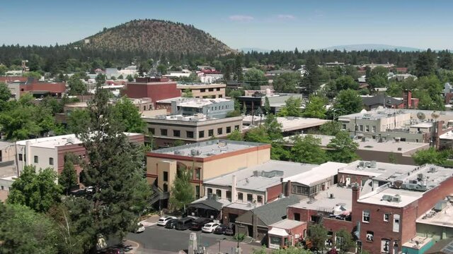 Aerial: Downtown Bend. In The Distance Is Pilot Butte, Oregon, USA