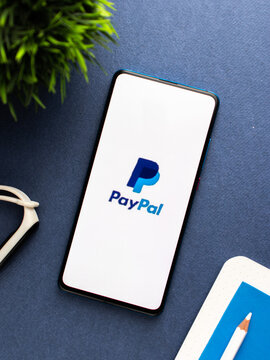 Assam, india - June 21, 2021 : Paypal logo on phone screen stock image.