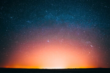 Amazing Beautiful Night Sky Glowing Stars Background Backdrop With Colorful Sky Gradient. Sunset...
