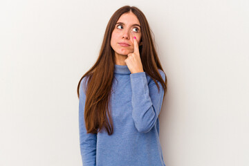 Young caucasian woman isolated on white background crying, unhappy with something, agony and confusion concept.