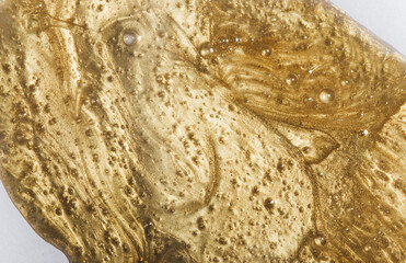 golden hyaluronic texture close-up, beauty concept