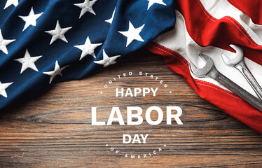 Fototapeta na wymiar Happy Labor Day. American Flag On Wooden Background