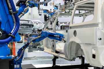 robot arm working in car factory