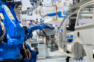 robot arm working in car factory