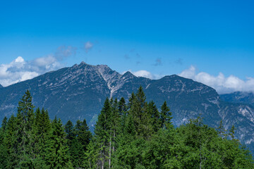 Naklejka na ściany i meble View from the Eckbauer mountain over the Bavarian Alps near Garmisch-Partenkirchen 