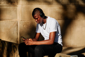 portrait of a black boy in the city - concept portrait