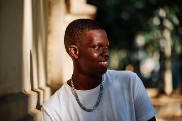 Obraz premium portrait of a black boy in the city - concept portrait