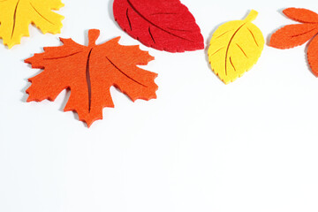 Yellow orange red autumn leaves, border frame, artificial plant, fall plant 