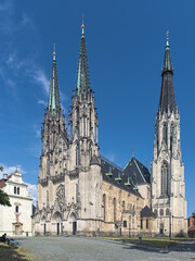 Fototapeta na wymiar St. Wenceslas Cathedral and Chapel of St. Anna in Olomouc, Czech Republic. The cathedral was consecrated in 1131. Present neo-Gothic appearance is from 1883-1892. The chapel is first mentioned in 1349