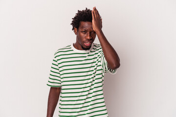 Young african american man isolated on white background  forgetting something, slapping forehead...