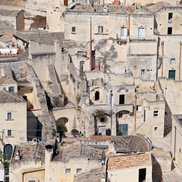Matera, Italy - August 17, 2020: View of the Sassi di Matera a historic district in the city of Matera, well-known for their ancient cave dwellings. Basilicata. Italy