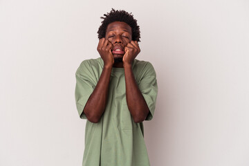 Young african american man isolated on white background  crying, unhappy with something, agony and confusion concept.