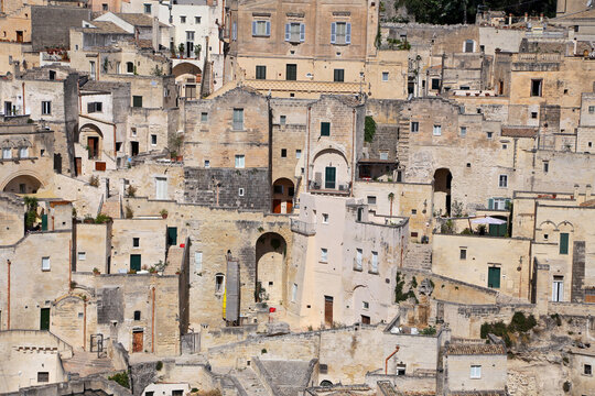 Matera, Italy - August 17, 2020: View of the Sassi di Matera a historic district in the city of Matera, well-known for their ancient cave dwellings. Basilicata. Italy