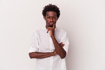 Young african american man isolated on white background  unhappy looking in camera with sarcastic expression.