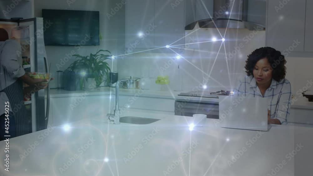Poster animation of networks of connections over couple using laptop