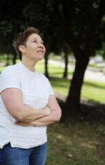 Outdoor portrait of 50 years old woman