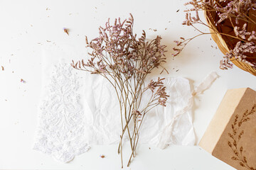 Dried Lilac Flowers Bouquet on white background. Flat lay, top view. 
