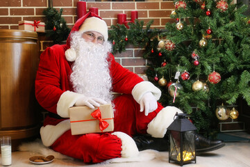 Santa Claus with gifts Christmas tree