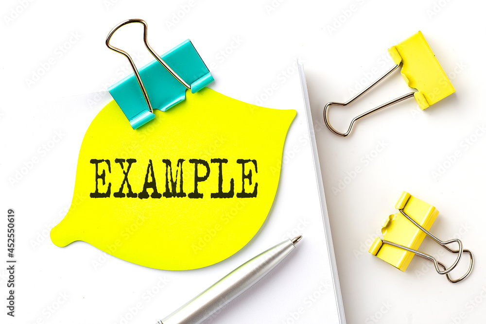 Poster sticker with example text on notebooks on the white background