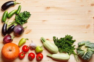 Top view of the harvest of vegetables, herbs. Autumn background. Copy space