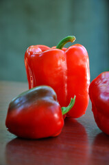 Fresh ripe colorful bell peppers or paprika as background, close up