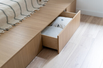 Bedroom interior, wooden bed at modern room.