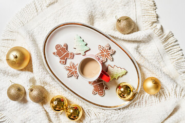 Merry Christmas background with Xmas decors and cookies. Tasty Christmas cookies and X-mas tree baubles. Celebrating Christmas and New year