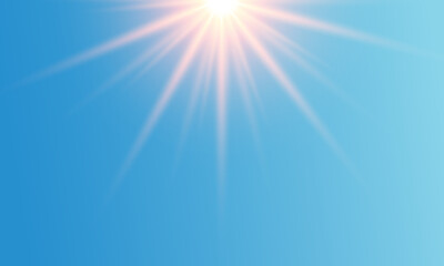 Bright sun on a blue background. Sun glare.

