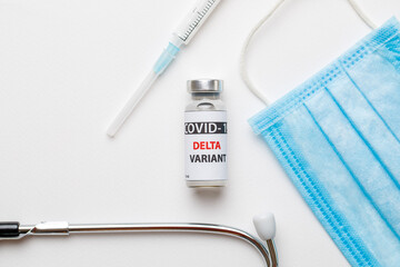 Vaccine bottles covid - 19 delta variant, vials medicine and syringe injection isolated on white....