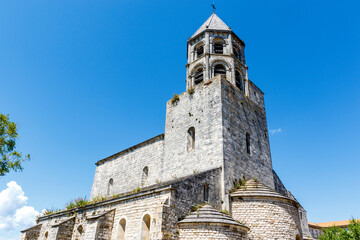 Fototapeta na wymiar Exterior of the Saint Michel church in La Garde Adhemar, Drôme, France, Europe