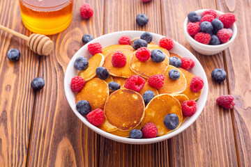 Mini pancakes . Delicious breakfast .