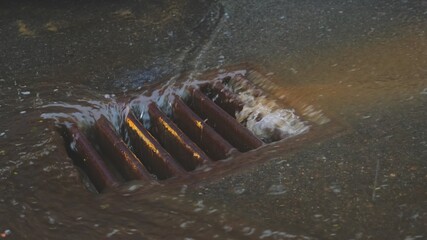 Street Water Drain Sewer Overflowing During Heavy Rainfall Storm Slow Motion	
