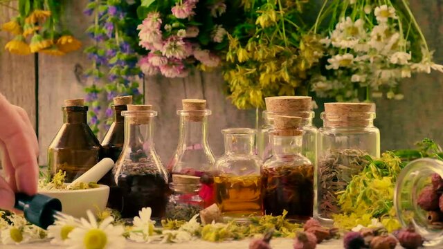 Bottled herbal tincture, homeopathy. Selective focus.